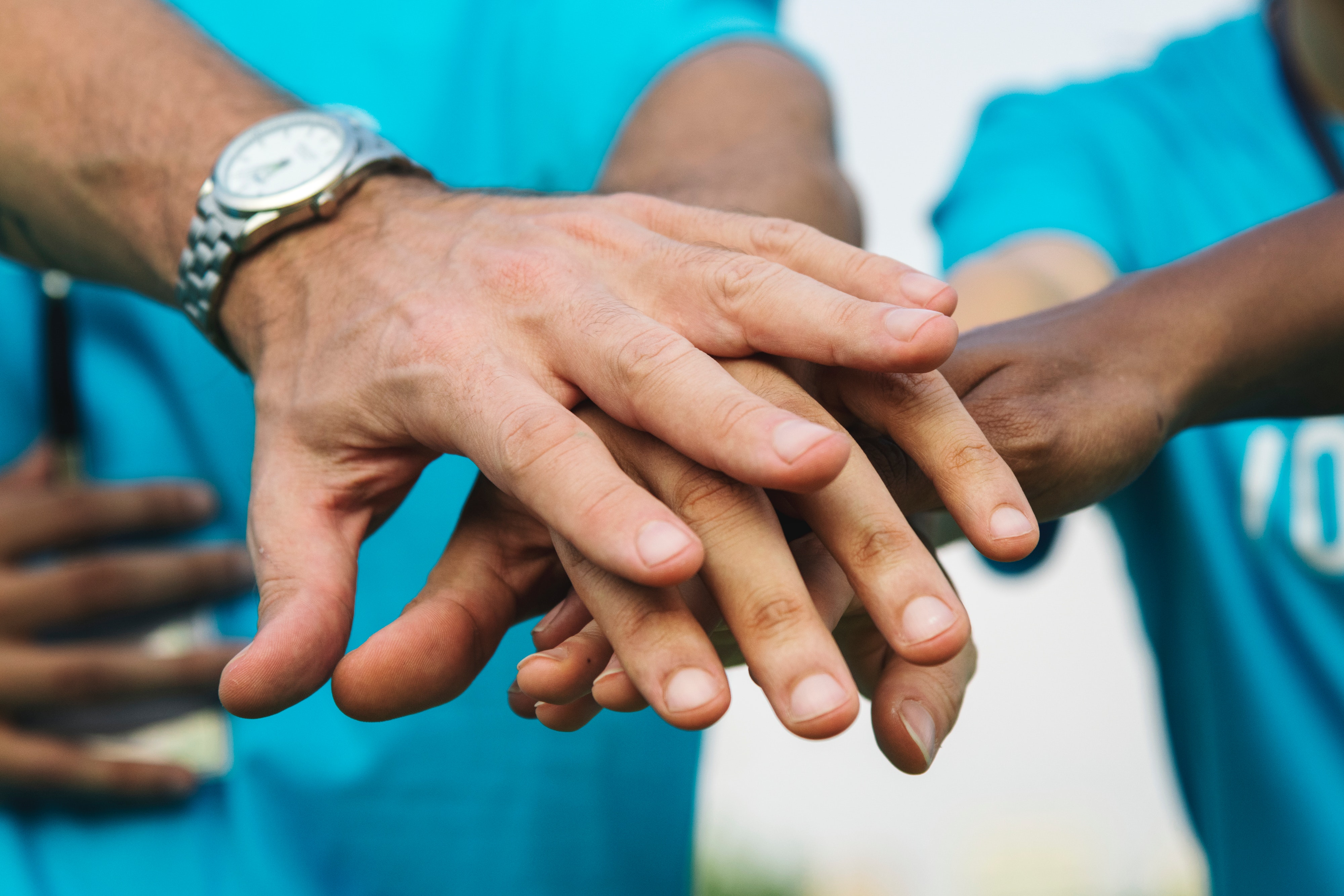Hands reaching out to one another